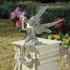 Design Toscano Fairy Of The West Wind Sitting Statue