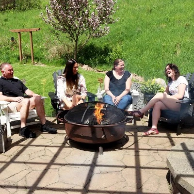 Sunnydaze Decor Sunnydaze Outdoor Camping Or Backyard Steel Round Cosmic Fire Pit With Spark Screen And Log Poker - 41.5" - Black 6 Sunnydaze Decor Sunnydaze Outdoor Camping Or Backyard Steel Round Cosmic Fire Pit With Spark Screen And Log Poker - 41.5" - Black - Image 6